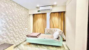 Classic Triple Room | Premium bedding, desk, laptop workspace, soundproofing - Premium Hotel M Shri near Mahakal Temple (Ujjain)