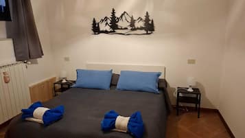 2 bedrooms, in-room safe, iron/ironing board, travel cot