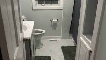 Hair dryer, towels, soap, toilet paper