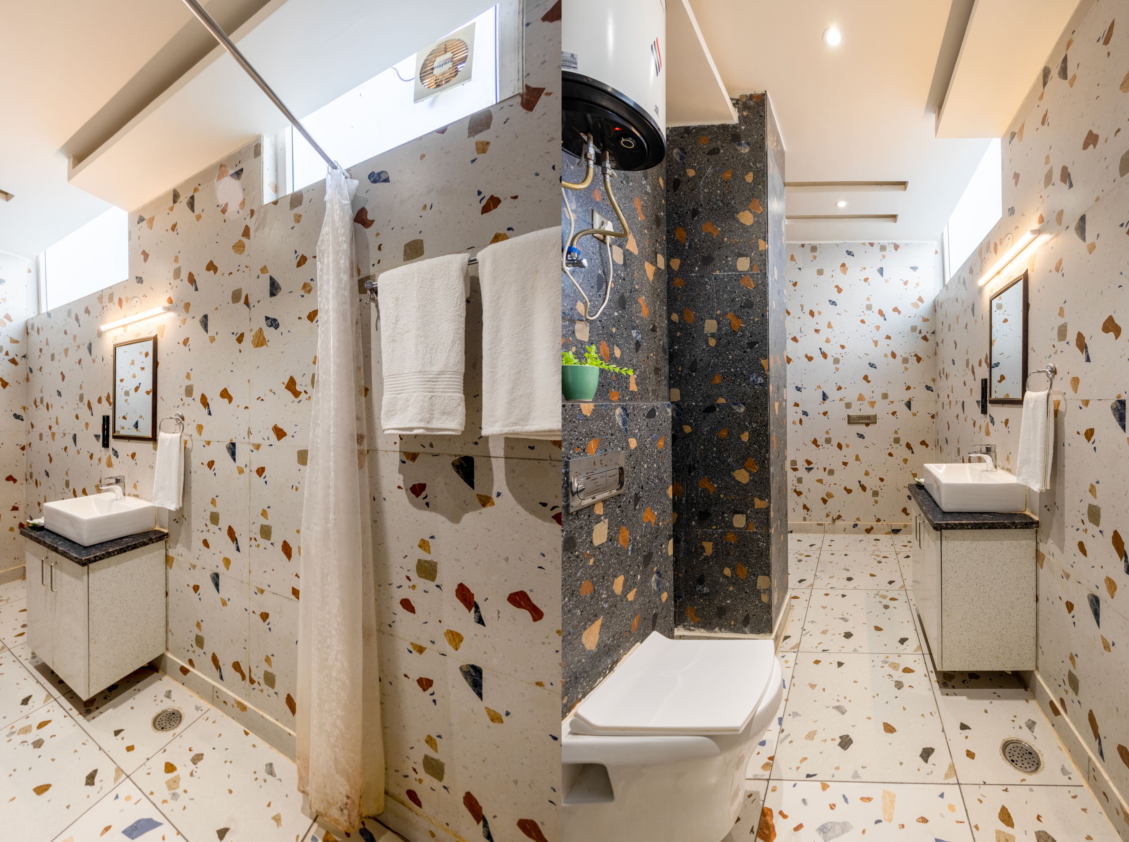 Un baño moderno con una bañera independiente, dos lavamanos y una zona de ducha.