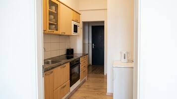 Leilighet – basic | Eget kjøkken | Ovn, kokeplater og kjøkkenutstyr