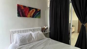 City Condo | Individually furnished, blackout curtains, iron/ironing board, free WiFi