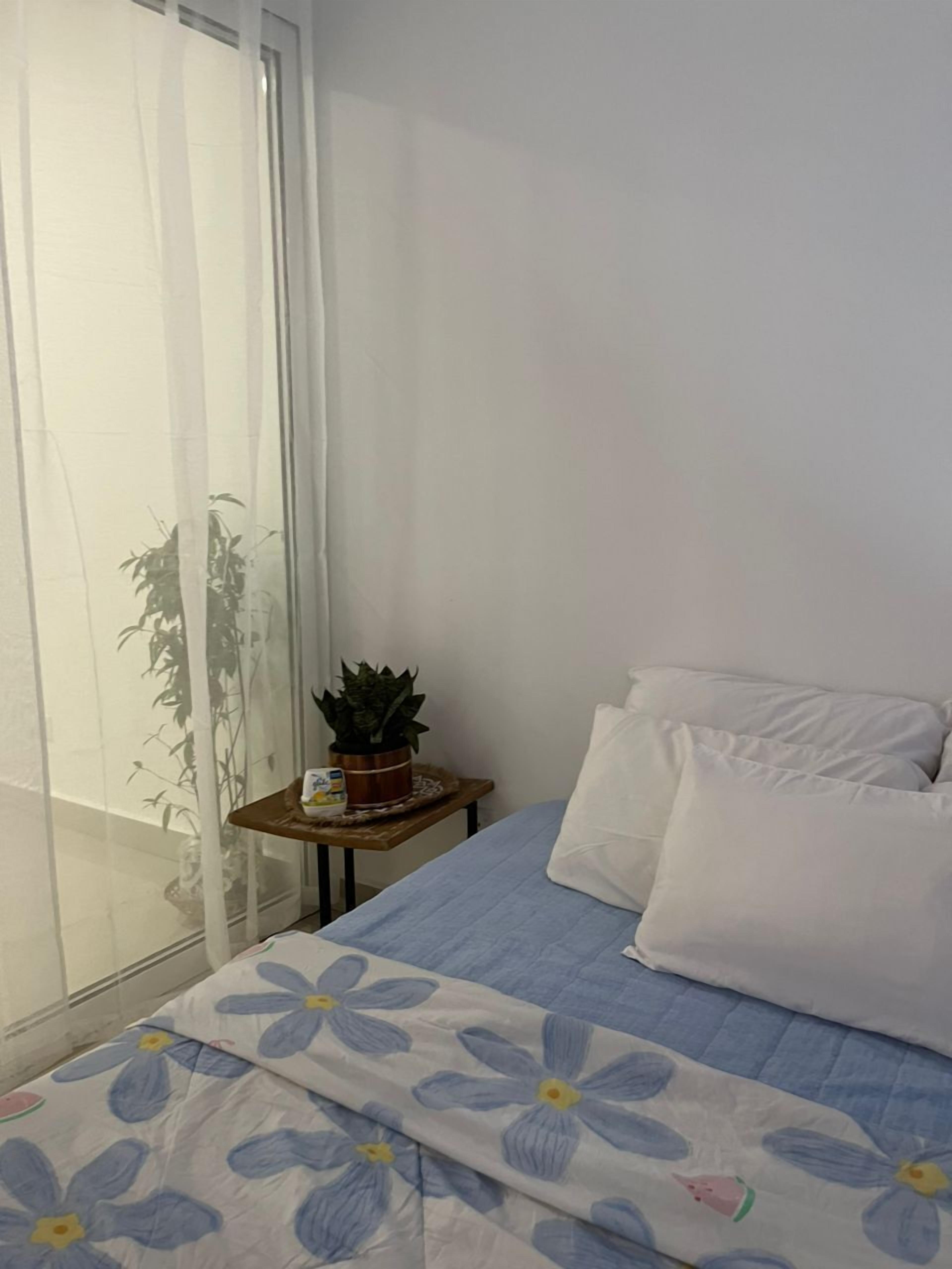 Apartment, Balcony, City View | Blackout curtains, iron/ironing board, free WiFi