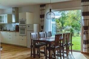 Private kitchen - Vacation home Pusteblume - peace, space & feel-good moments in Saal (Saal)