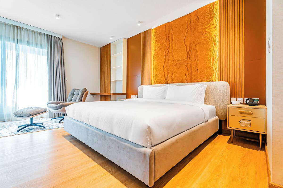 Luxury Suite, Balcony | Living area | Flat-screen TV