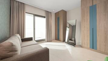 Deluxe Double Room, Balcony, City View | Desk, iron/ironing board, free WiFi