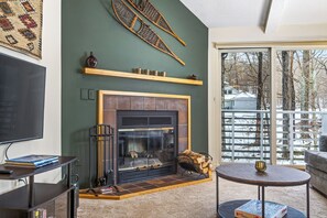 TV, fireplace - Woods Village 30 lovely 2 bedroom with full service pool and Free Spa Access, Near Golf Course (Killington)