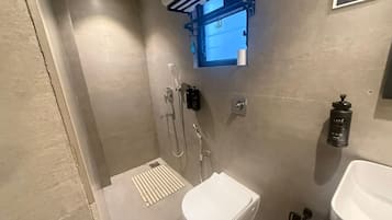 Comfort Room, City View | Bathroom | Shower, free toiletries, hair dryer, slippers