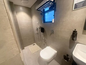 Comfort Room, City View | Bathroom | Shower, free toiletries, hair dryer, slippers - Firangipani EcoSuites (New Town)