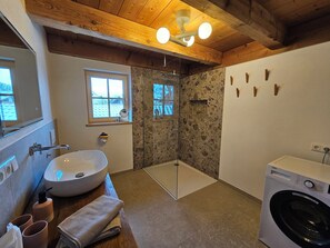 Shower, hair dryer, towels, soap