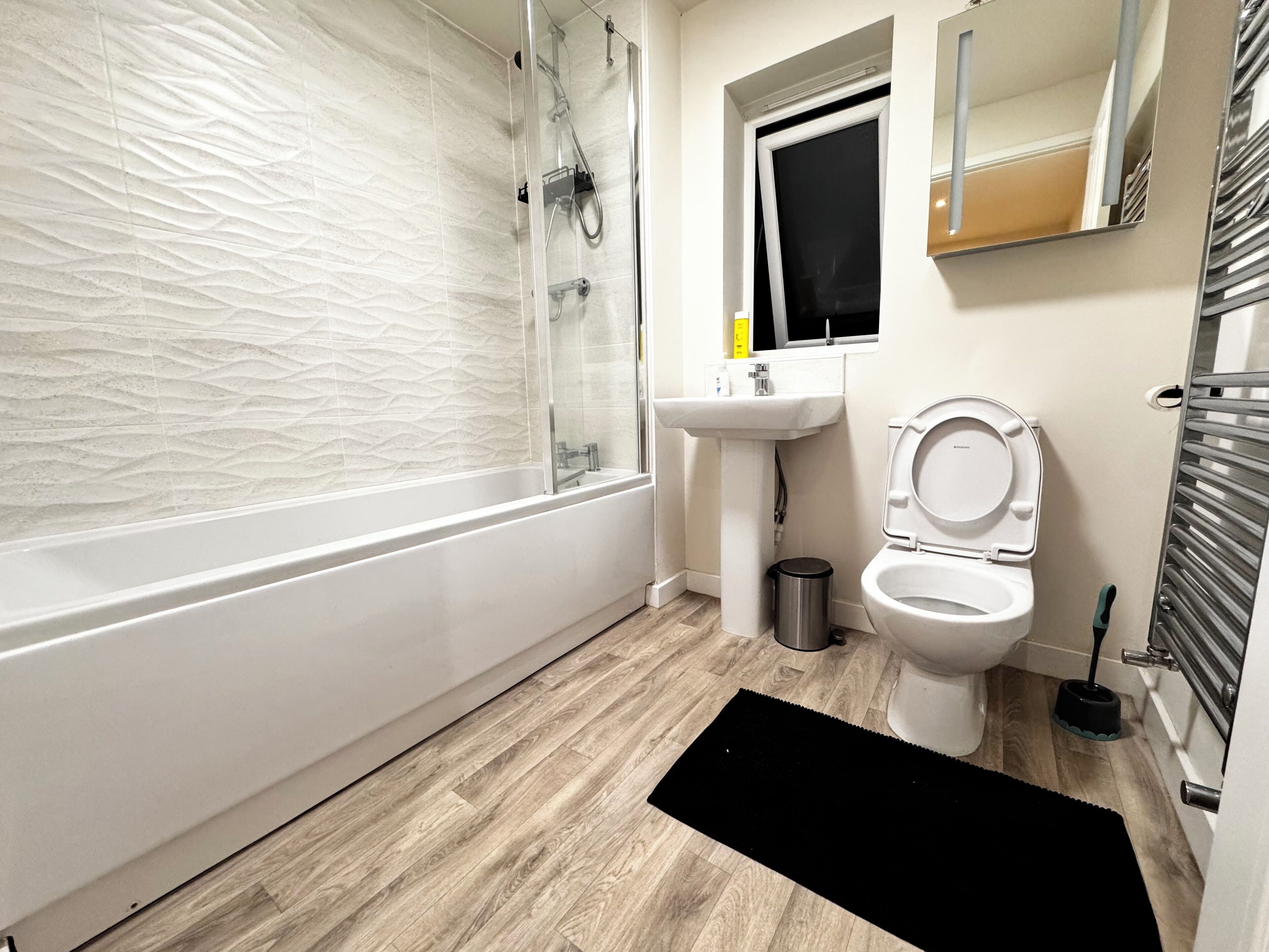 Shower, towels, soap, toilet paper