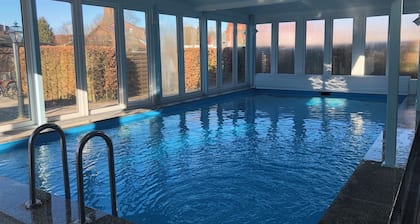 Your "home port" in Butjadingen - spacious family apartment with pool*sauna*dogs