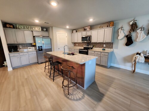 Relaxation awaits in this spacious 4 bedroom..Ready for all of your memories!