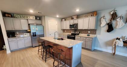 Relaxation awaits in this spacious 4 bedroom..Ready for all of your memories!