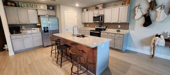 Relaxation awaits in this spacious 4 bedroom..Ready for all of your memories!