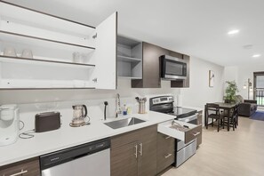 Fridge, microwave, oven, stovetop - Downtown Loft Near Stadiums w/ Gym. Pet-Friendly! (Cleveland)