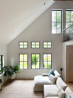 TV, fireplace - Modern Coastal Compound w Pool + Cottage in Old Village Fire Pit Screened Porch (Mount Pleasant)