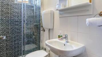 Shower, free toiletries, hair dryer, towels