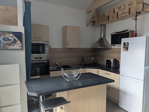 Mikrobølgeovn, ovn og kokeplater