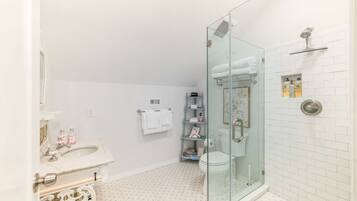 Shower, hair dryer, towels, soap