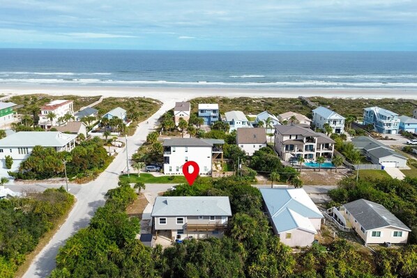 A coastal residential area with houses, a beach, and a marked location. - Good Vibrations - Steps to the Beach! (St. Augustine)
