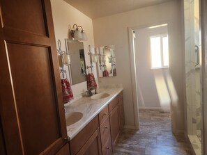 Shower, jetted bath, towels, soap