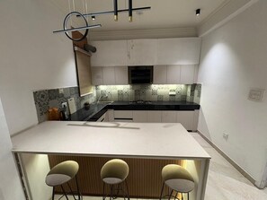 Royal Suite 2BHK Flat With Kitchen | Living area | 43-inch Smart TV with digital channels - Luxury Sangam Homestay (Prayagraj)