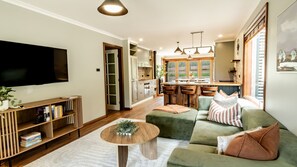 Smart TV, fireplace, books