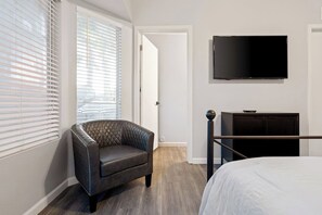 Iron/ironing board, travel crib, free WiFi, bed sheets