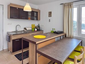 Familie appartement, uitzicht op zee | Een strijkplank/strijkijzer, gratis wifi