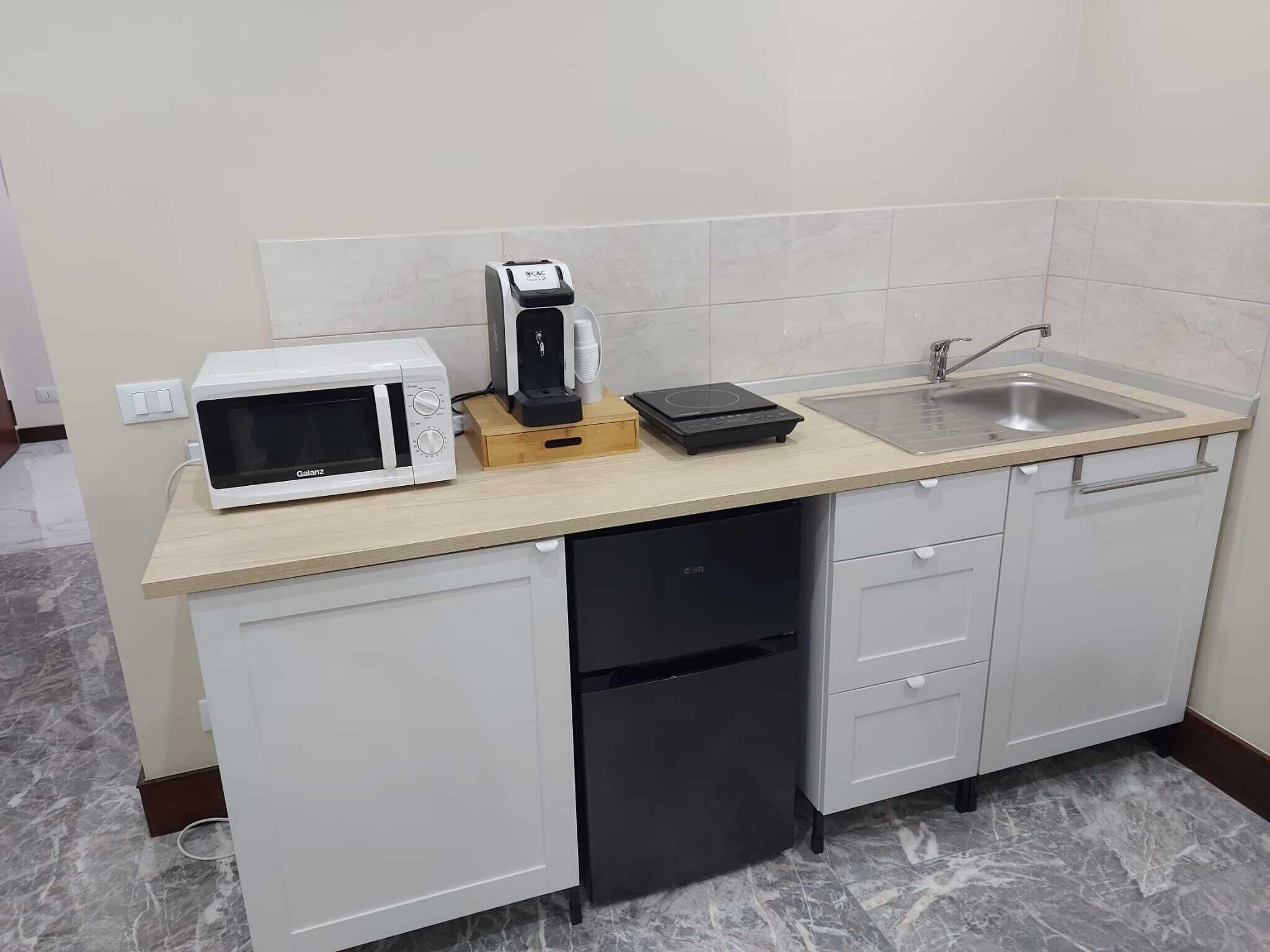 Camera Superior, balcone, vista città | Cucina privata