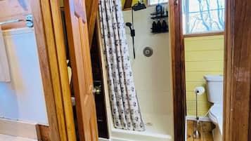 Shower, towels, soap, toilet paper