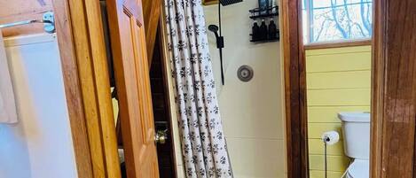 Shower, towels, soap, toilet paper