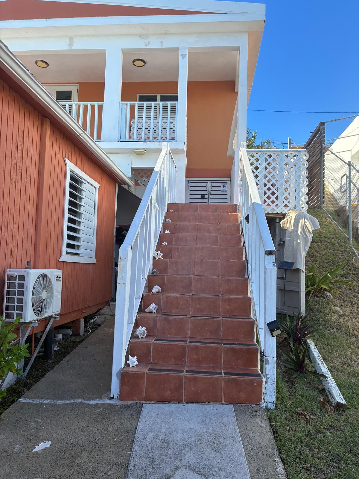 Steps leading to entrance of the house once on porch house is on one level