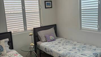 2 bedrooms, desk, iron/ironing board, travel crib