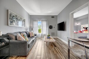 Gallery Condo, 1 Bedroom, Hot Tub | Living area | 50-inch Smart TV with digital channels, foosball, toys
