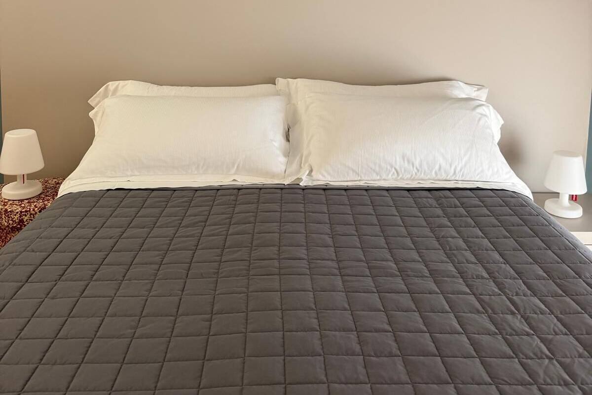 Deluxe kamer, 1 twee- of 2 eenpersoonsbedden, uitzicht op binnenplaats | Luxe beddengoed, verduisterende gordijnen, geluiddichte muren