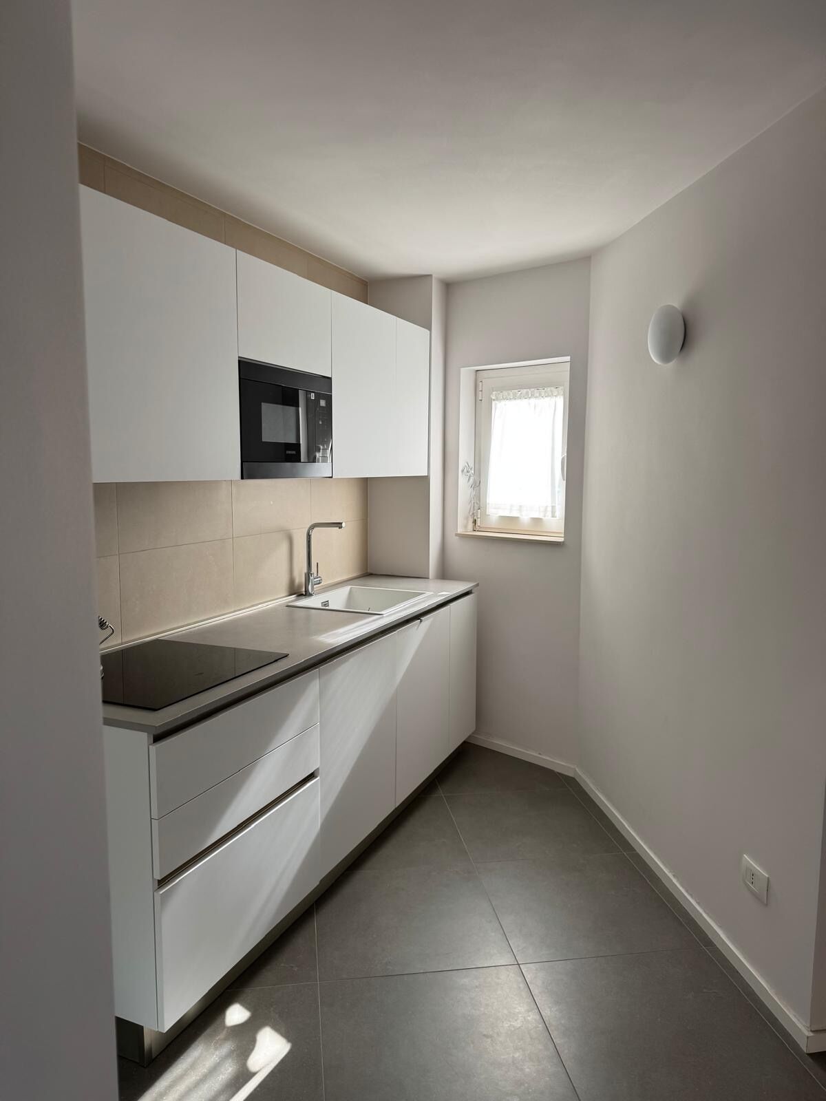 Mini-fridge, microwave, electric kettle