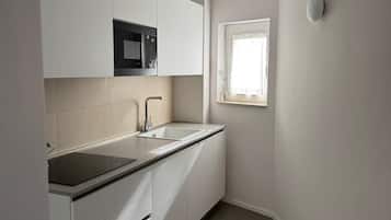 Mini-fridge, microwave, electric kettle