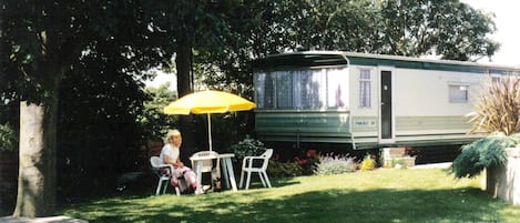 Desk, laptop workspace, blackout curtains, iron/ironing board