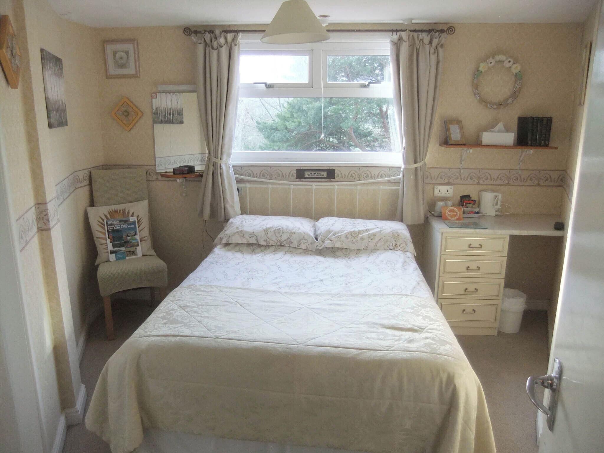 Double Room, Ensuite, Partial Sea View | Desk, laptop workspace, blackout drapes, iron/ironing board