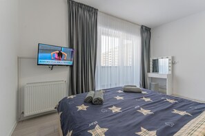 1 habitación, tabla de planchar con plancha, wifi y ropa de cama 