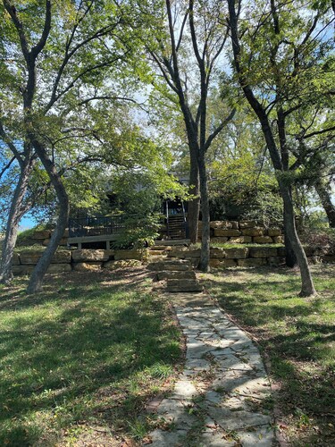 Spacious 4-bedroom house steps away from the water at beautiful Fort Scott Lake.