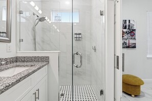 Shower, hair dryer, towels, soap - Hard Rock Luxury Home (Tampa)