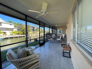 Terrace/patio - Bright Waterfront 2BR Condo with Private Dock. Only Minutes to Downtown Naples (Naples)
