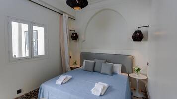 Coffres-forts dans les chambres, fer et planche Ă repasser