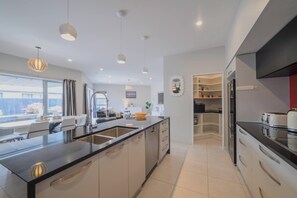 Fridge, microwave, oven, stovetop - Modern Family Home with Outdoor Living in Wigram (Christchurch)