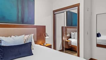 1 bedroom, desk, iron/ironing board, travel crib