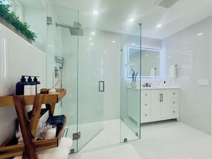 Shower, hair dryer, towels, soap