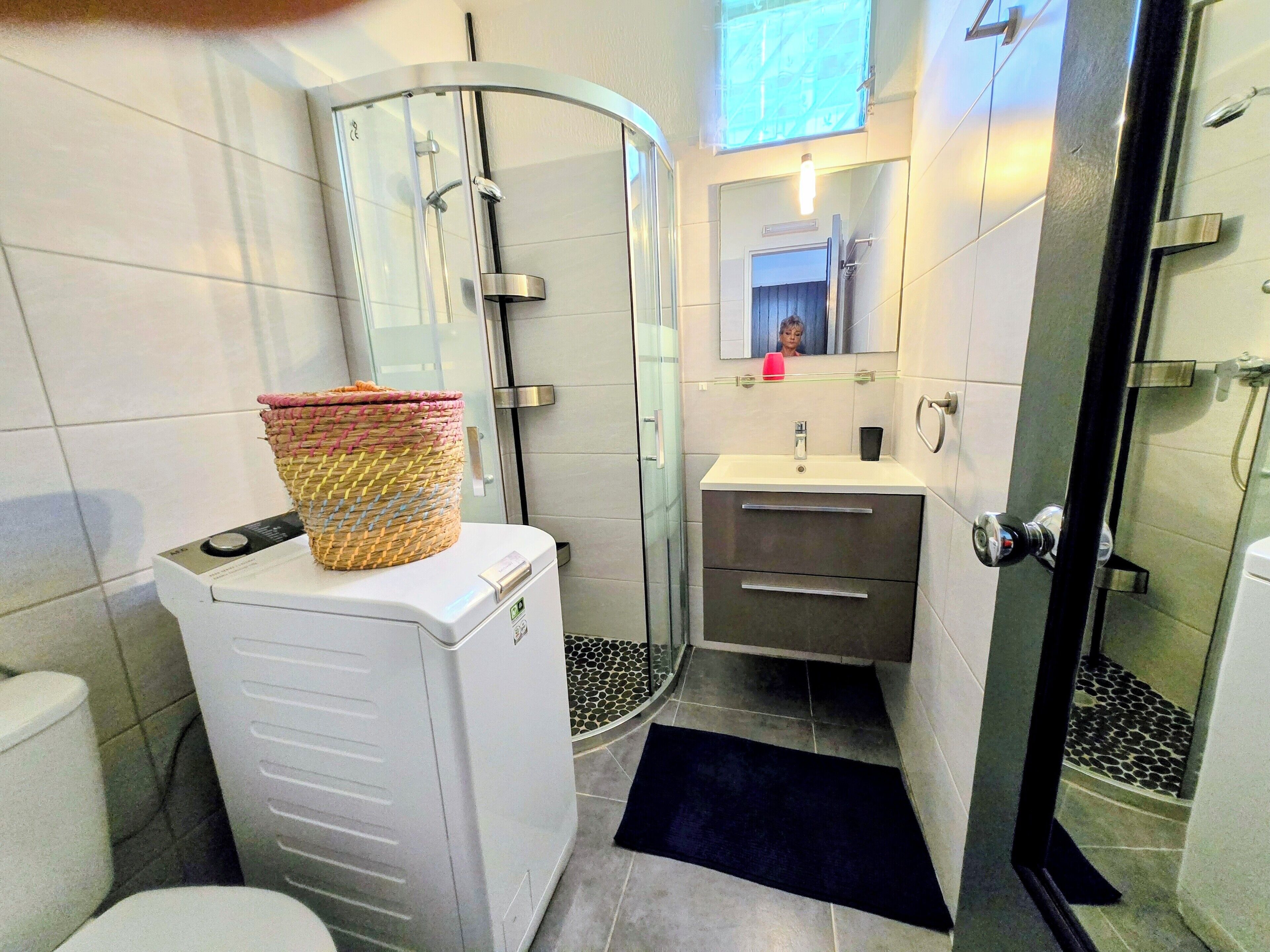 Shower, towels, toilet paper